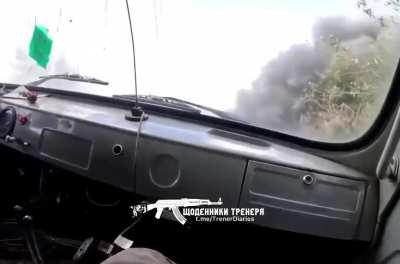 Ukrainian MedEvac team drives through shelling near the frontline.