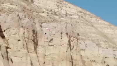 French athlete Valentin Delluc paragliding over breathtaking Capadocia, Turkiye