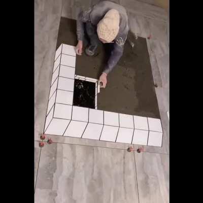 How the illusion of 3D bricks are made.