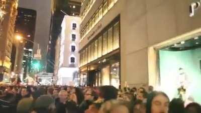 People in front of Trump Tower chanting 