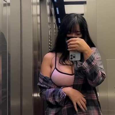 Looking sexy in the elevator