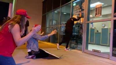 Female Trump supports gather outside the Clark County election department. They say they are praying justice will be done and that righteousness prevails.