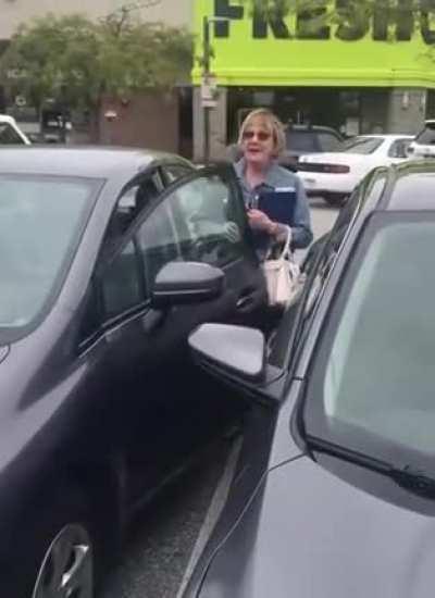 Another racist Karen but this time one who also doesn’t know how to park properly