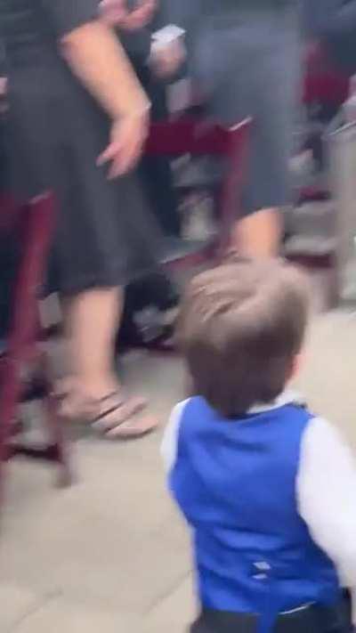 The little boy couldn't contain his excitement when he saw his mom as a bride