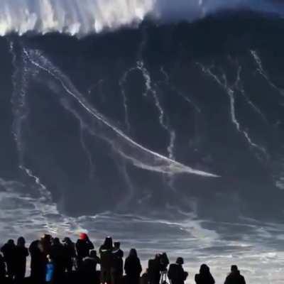 Sebastian Steudtner, a German pro surfer, rode a wave over 115 feet tall at Nazare, Portugal, a record breaking surf!