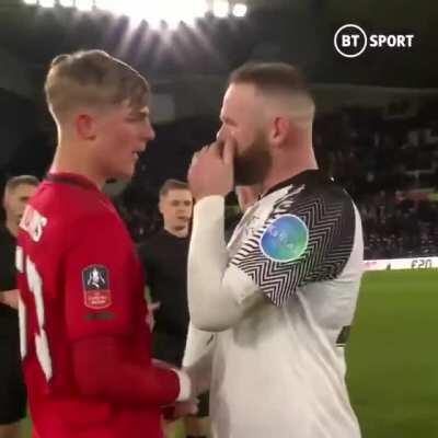 Wayne Rooney with a hug for Solskjaer and some words of encouragement for Brandon Williams and finally applauding the relentless away support.