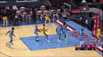 LeBron turns around and stares at the Lakers bench before draining the 3