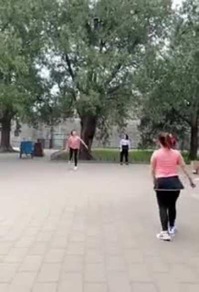 These Girls playing badminton with legs!