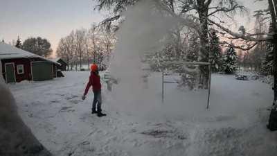 Cold enough to do this today! Hot water frozen instantly. Never get bored of doing this!