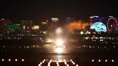 B-1B Lancer takes off with Las Vegas in the background.