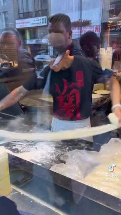 Making noodles in the window