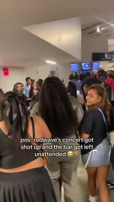 People taking advantage of a bar after someone shot up a Robwade concert. 