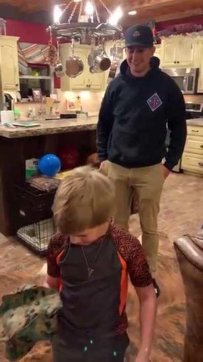 Marine comes home and surprises his little brother