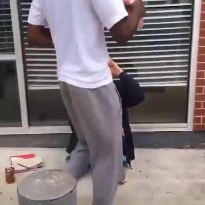 Group of guys pours soda over homeless vet