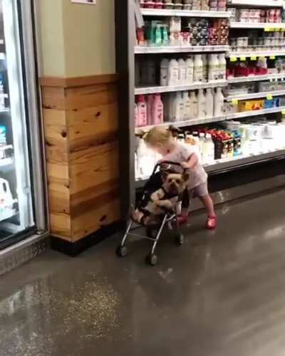 Just a responsible women shopping with her baby