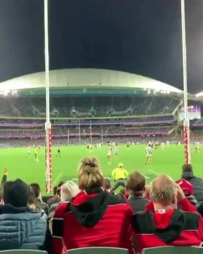 Young Port Adelaide fan gets a football to the face during the Port Adelaide vs St Kilda match in the AFL