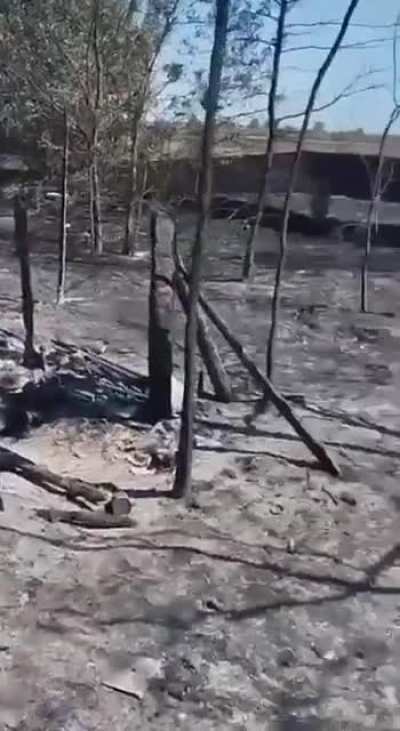 Footage of a Russian military showing the aftermath of a Ukrainian thermite drone working on their position