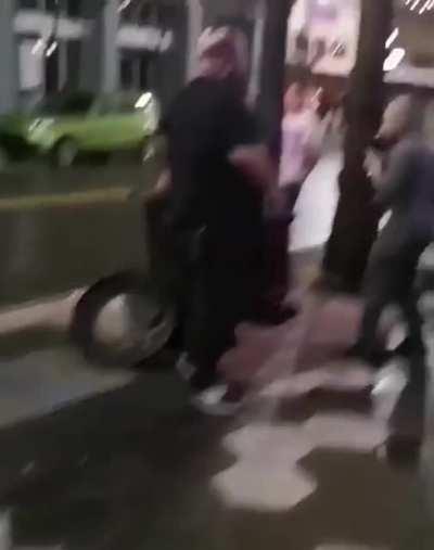 Drunk patron makes a threat and a bouncer handles it.