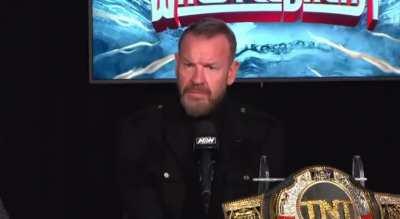 Bryan Alvarez asks Christian Cage a question 