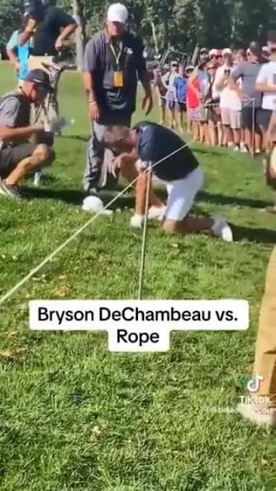 Golfer loses a fight with a rope barrier 