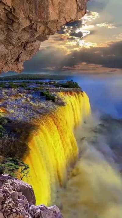 Igauzu Golden waterfall is the most beautiful view to witness, shoutout to the camera man. He crouched 2 days and 2 nights to capture this and the video is worth 18,000$