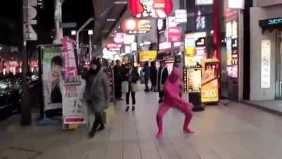 Pink guy dancing to meshuggah