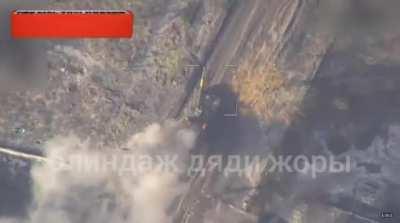 a Ukrainian T64-BV is hit by a lancet. it starts burning and then explodes