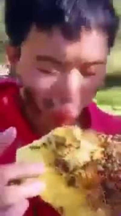 Dude eating raw honeycomb