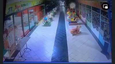 Caught in the cctv footage in a mall at night