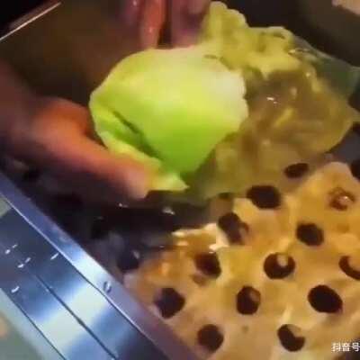 Making fake lettuce which is usually displayed in the windows of restaurants so you 