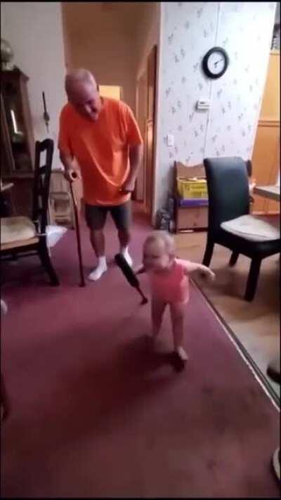 Baby imitates her grandpa’s walk with a cane, 😂😆