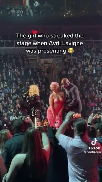 Avril Lavigne confronts topless protestor onstage at the 2023 Juno Awards