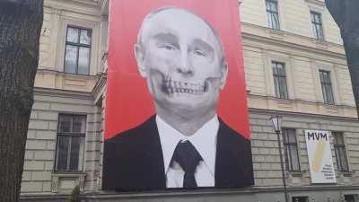 A poster in front of the Russian embassy in Riga