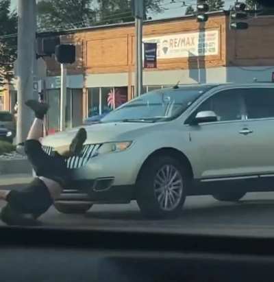 Guy films Cybertruck - man gets plowed by SUV - guy keeps filming Cybertruck