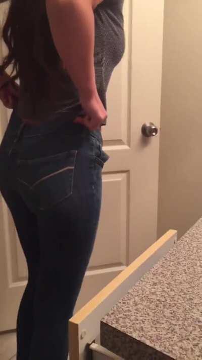 Getting in her jeans