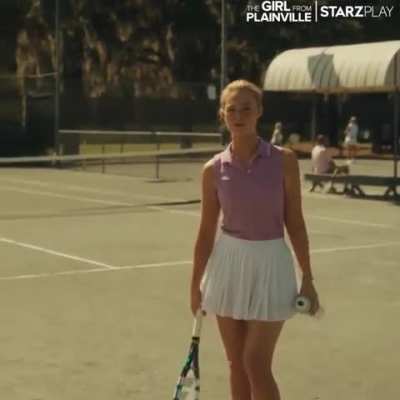 Elle in a tennis skirt