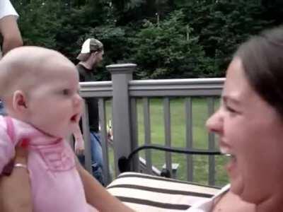 Baby and aunt growling at each other