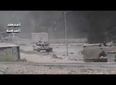 Syrian Army tank shell is fired almost directly at the camera somewhere near Damascus - 2013