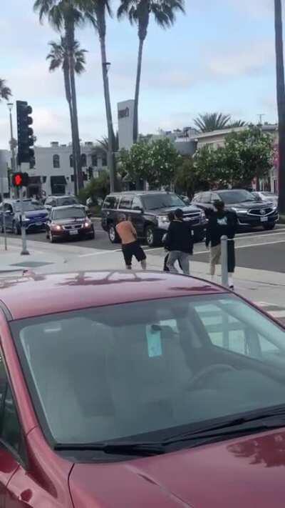 Hermosa Beach - Kid gang beats up adult in parking lot