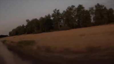 Russian soldiers on pickup truck have close call with Ukrainian FPV drone chasing them.