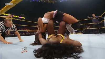 Naomi dominating AJ Lee