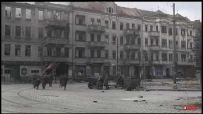 Russians in Berlin 1945. Almost blew his comrade's head off.