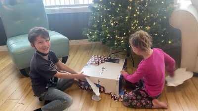 My gamer son got to experience his first ever Christmas console unboxing. My non-gamer daughter, however, was not impressed.