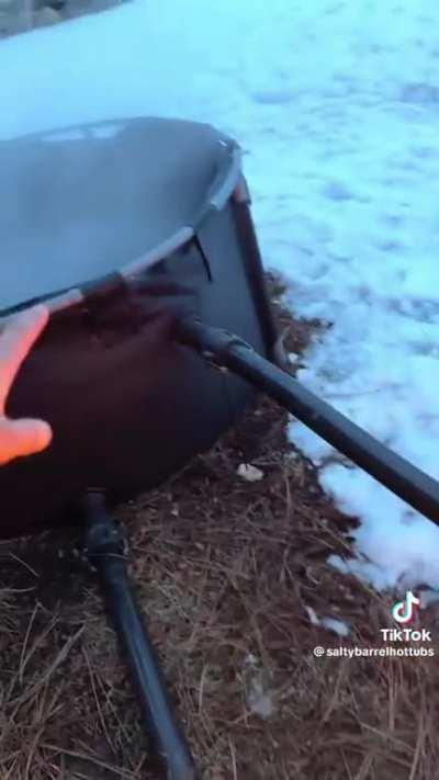 heating an outdoor tub with fire