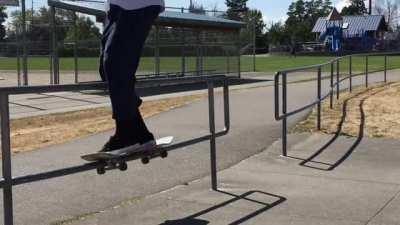 flip tricks on a rail