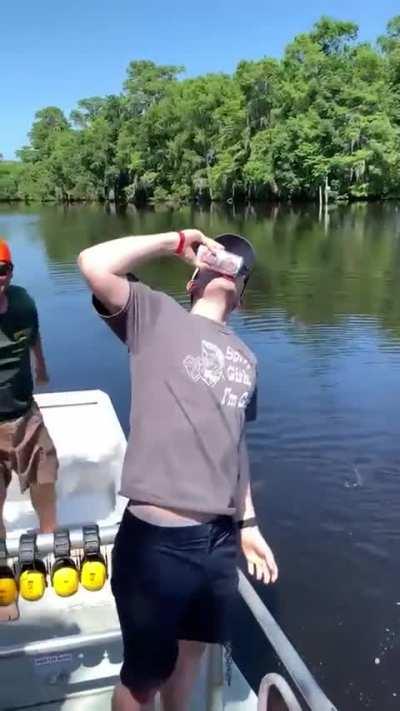 a couple good old Bayou boys using a gator as a can opener