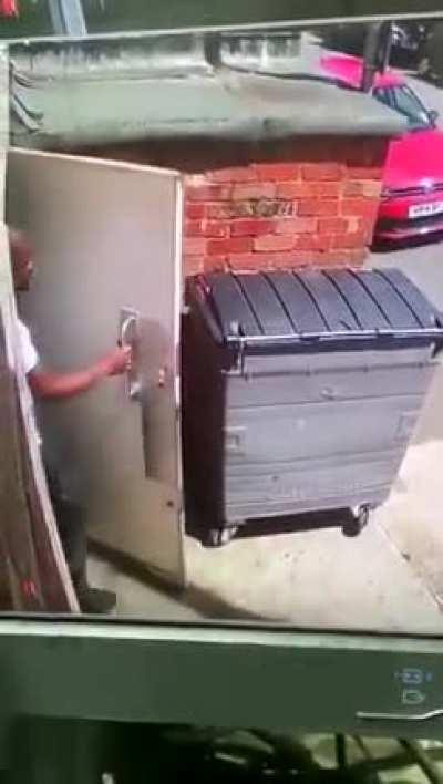 Man takes a dump behind trashcan and gets caught