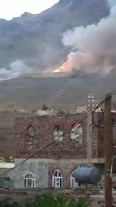 A Houthi missile depot was bombed by the Saudi air force, resulting in missiles flying at all directions (2015).