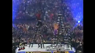 Edge spears Jeff Hardy off of a ladder in what is considered the best TLC match of all time