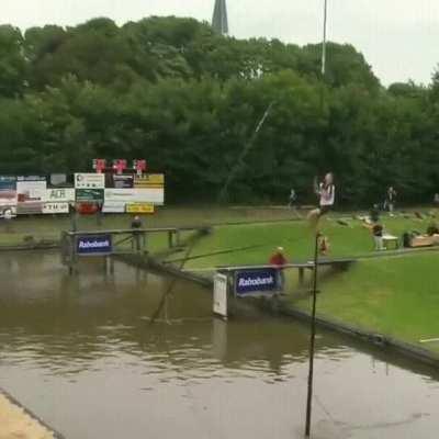 This is Fierljeppen, also known as Dutch Canal Vaulting.